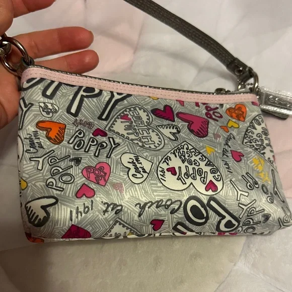 Coach Poppy Graffiti Silver and Pink Wristlet With Heart Design. - Picture 3 of 8